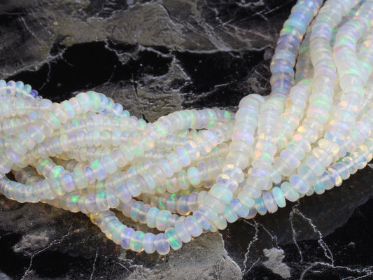 White Ethiopian Opal 3mm - 5mm Smooth Rondelles Bead Strand