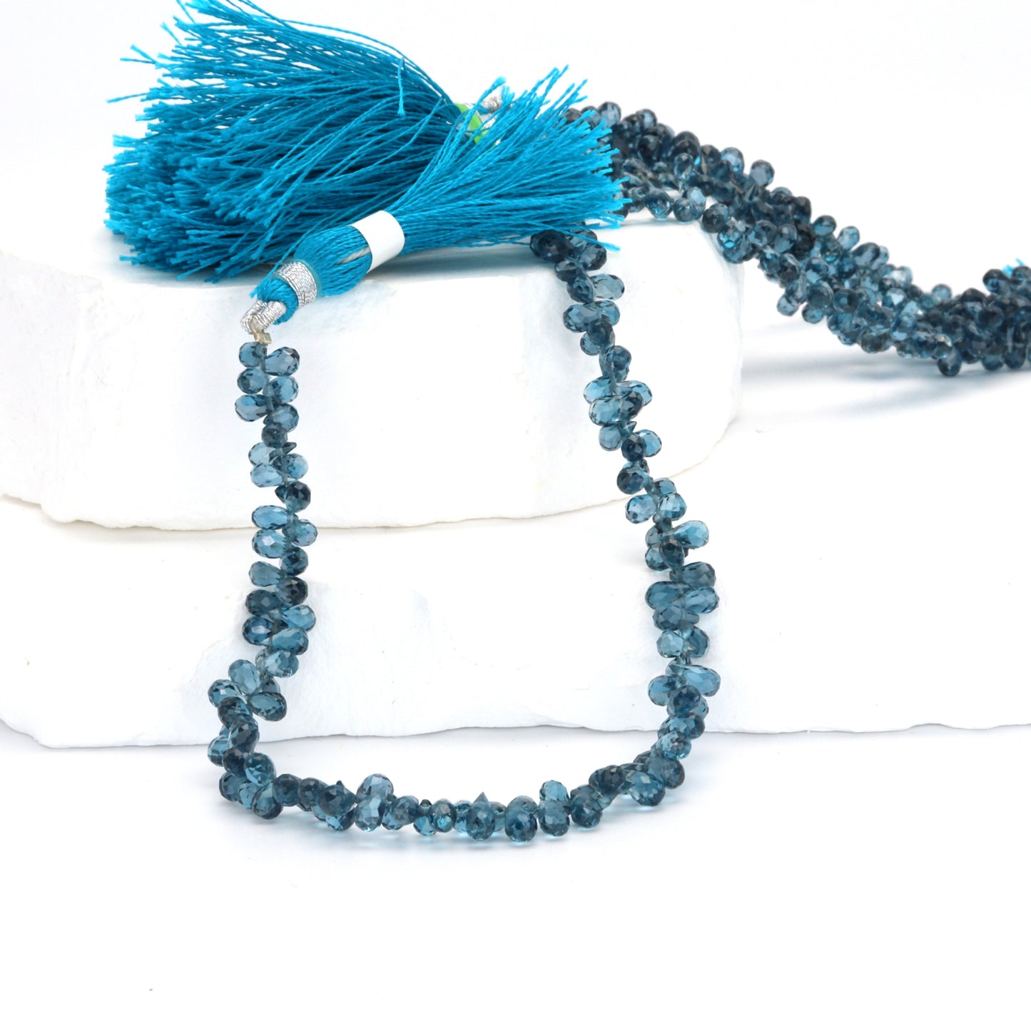 AA London Blue Topaz 3x5mm Faceted Teardrop Briolettes Bead Strand