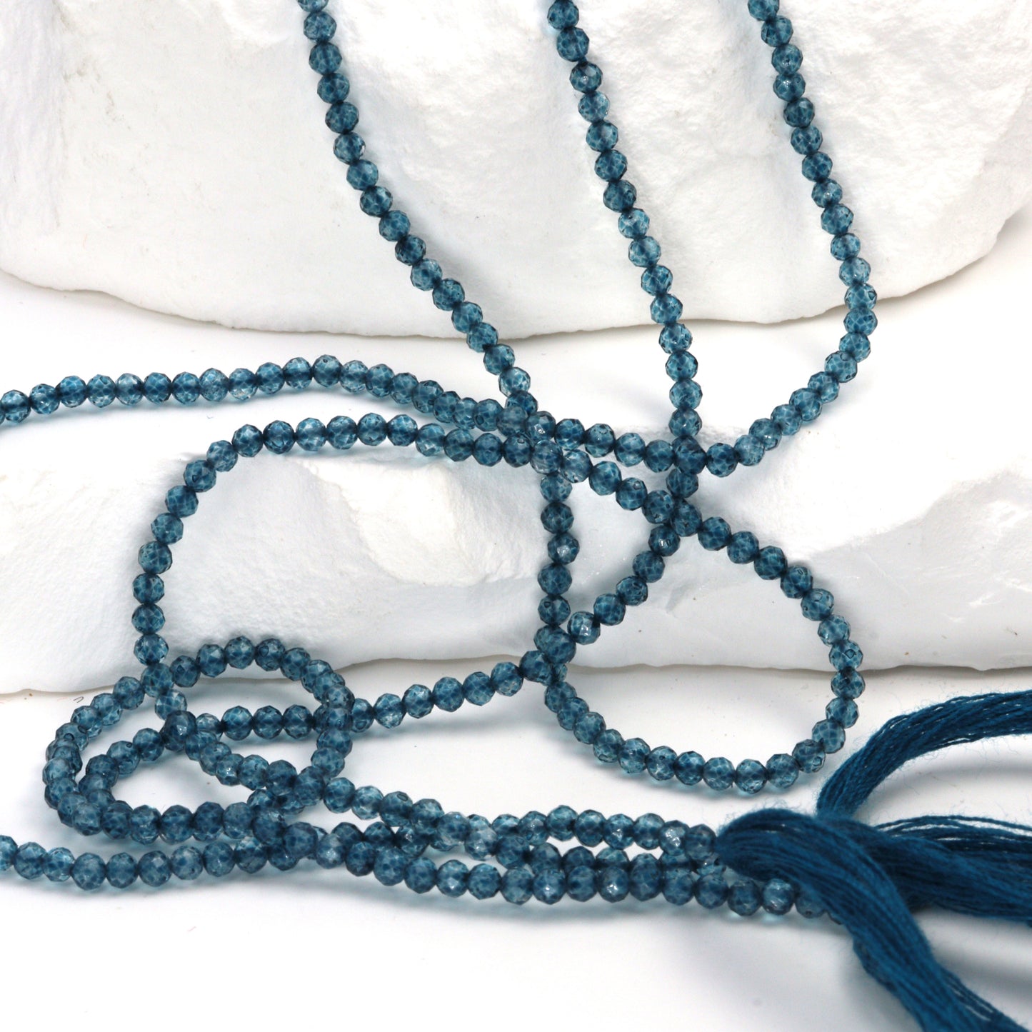 Coated London Blue Quartz 2.5mm Faceted Rounds