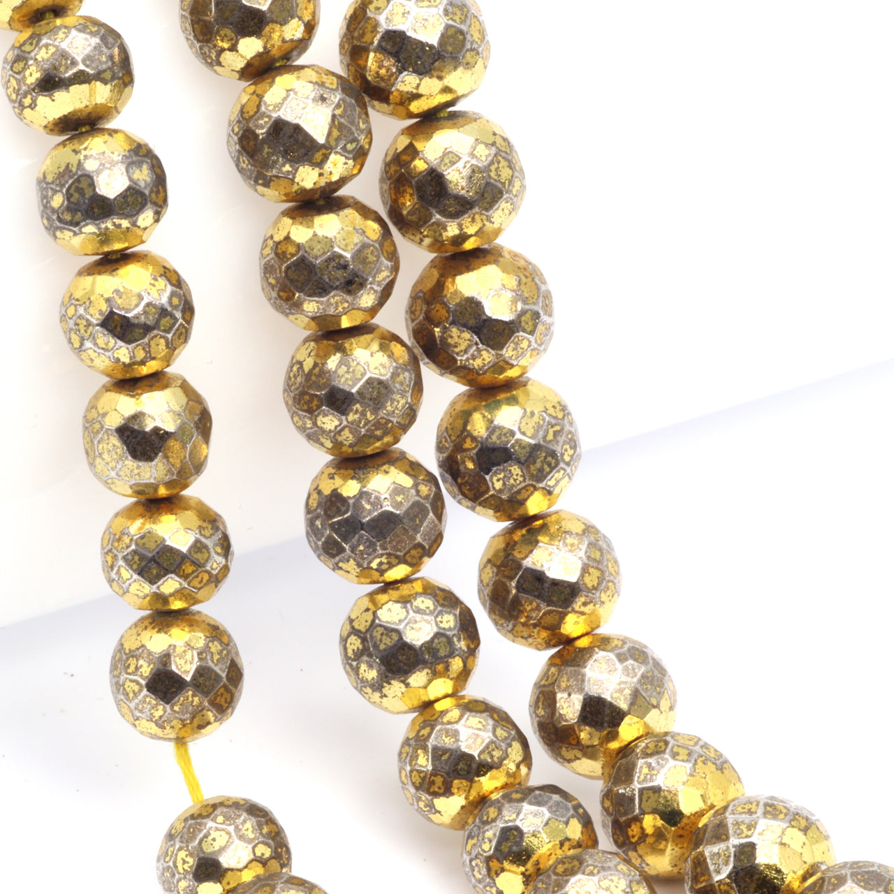 Gold Plated Pyrite 8mm Faceted Rounds