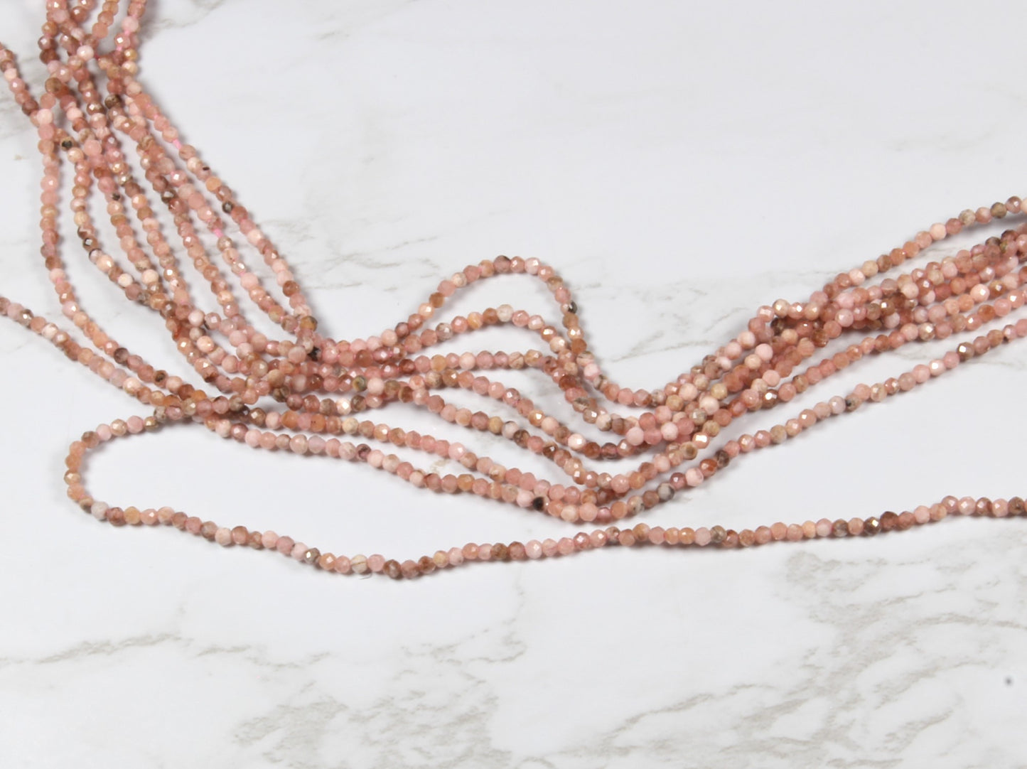 Pink Rhodochrosite 2mm Faceted Rounds