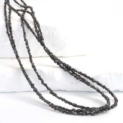 Black Diamond 3x2mm - 4x3mm Faceted Chips Bead Strand