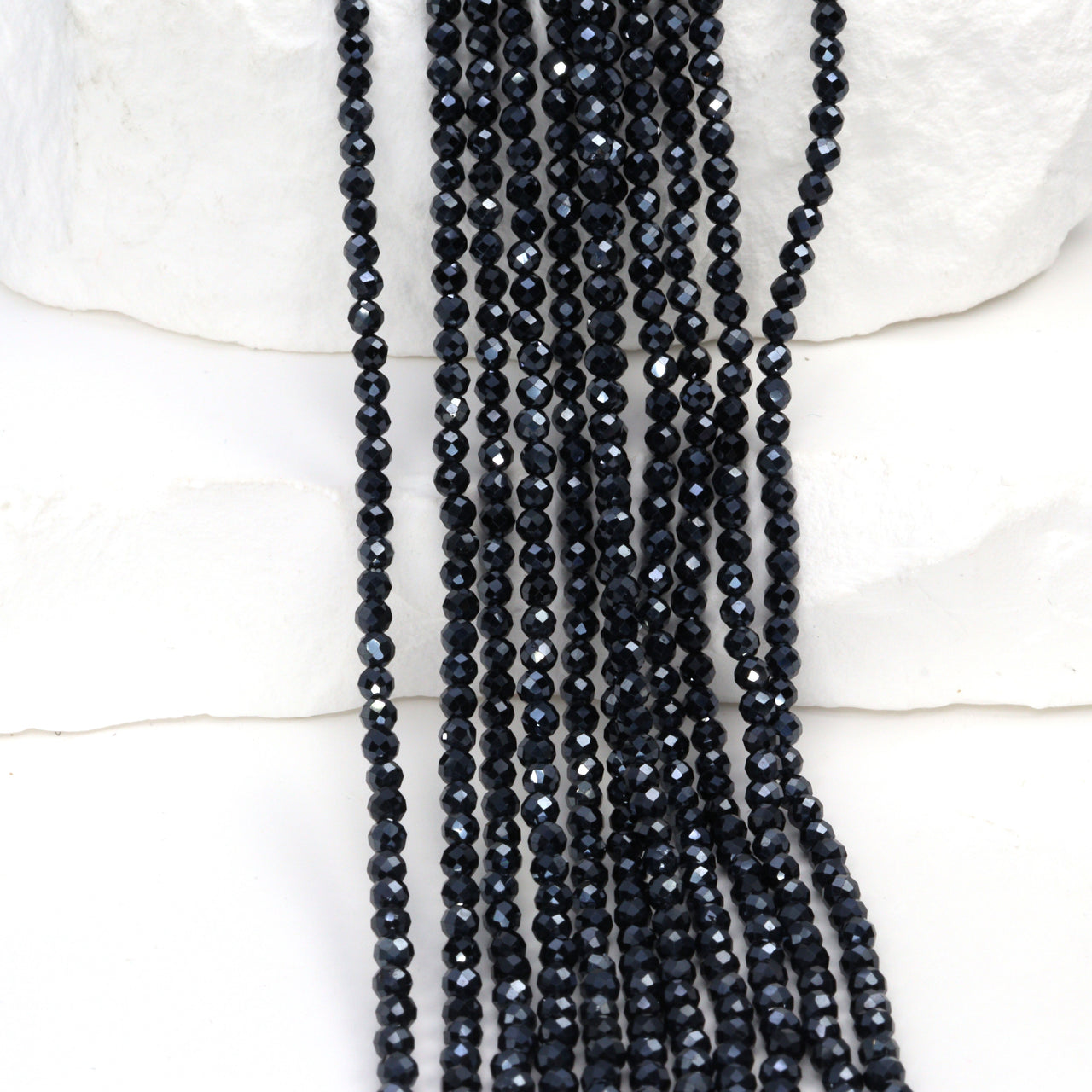 Coated Black Spinel 2.5mm Faceted Rounds