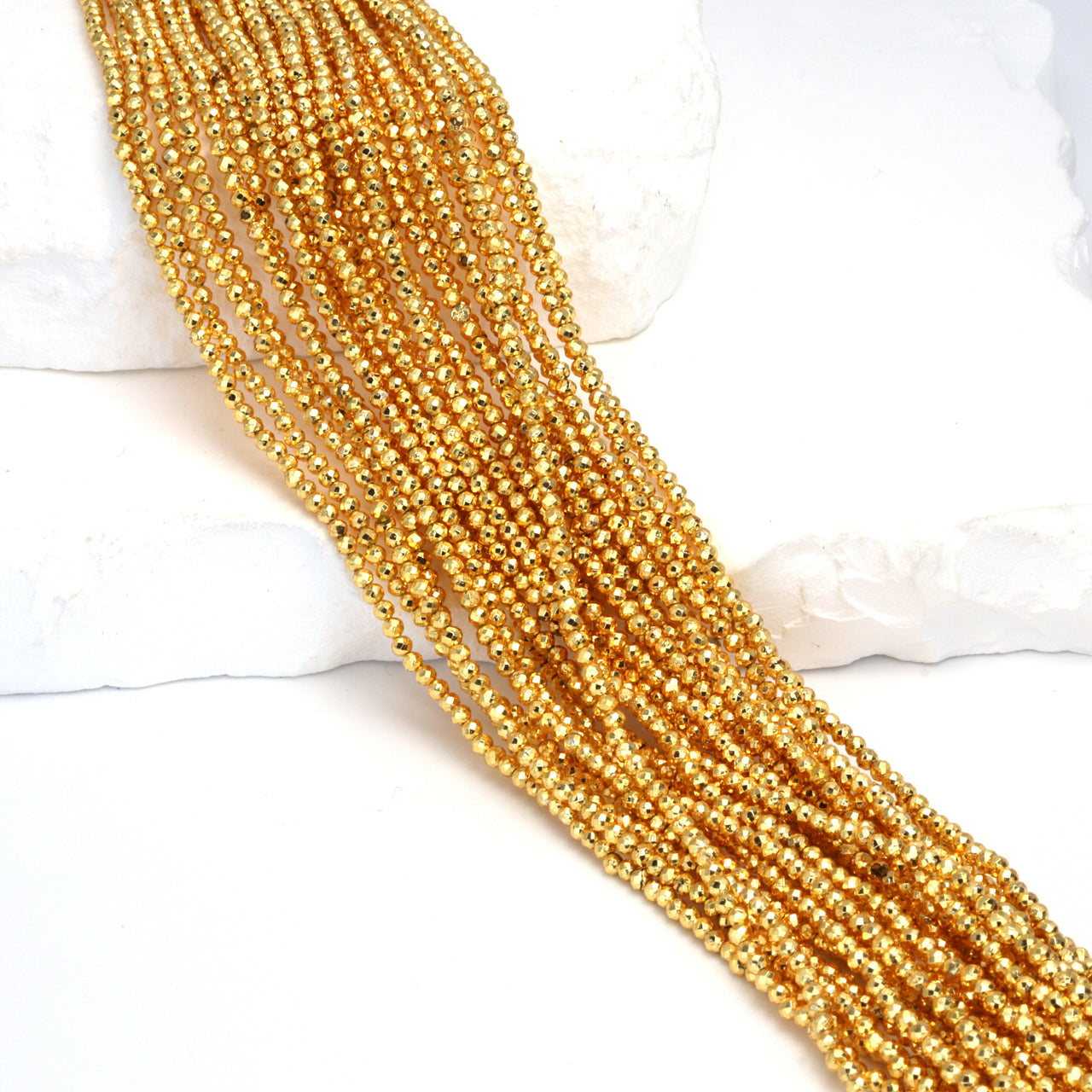Gold Plated Pyrite 2mm Faceted Rounds
