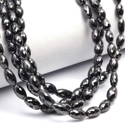 Black Diamond 5x3mm - 9x4mm Faceted Drums Bead Strand