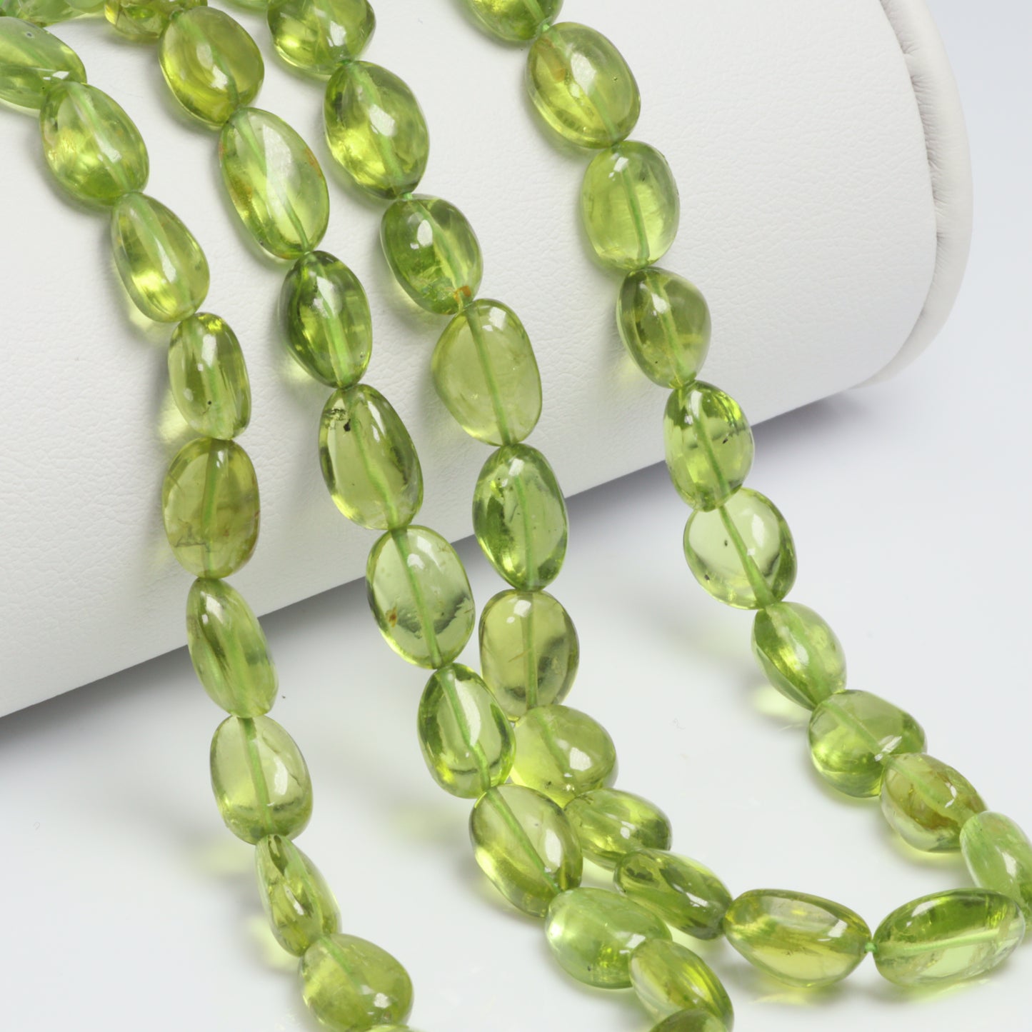 AA Green Peridot 8x6mm - 10x7mm Smooth Nuggets Bead Strand