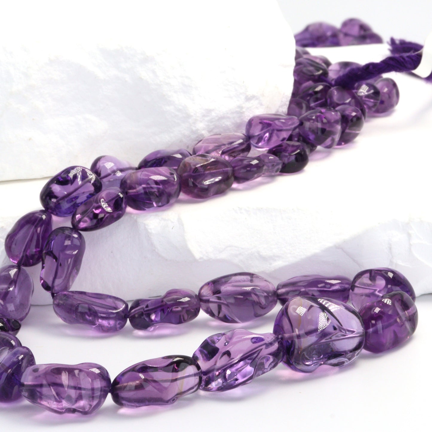 Purple Amethyst 10x8mm - 11x9mm Smooth Nuggets Bead Strand