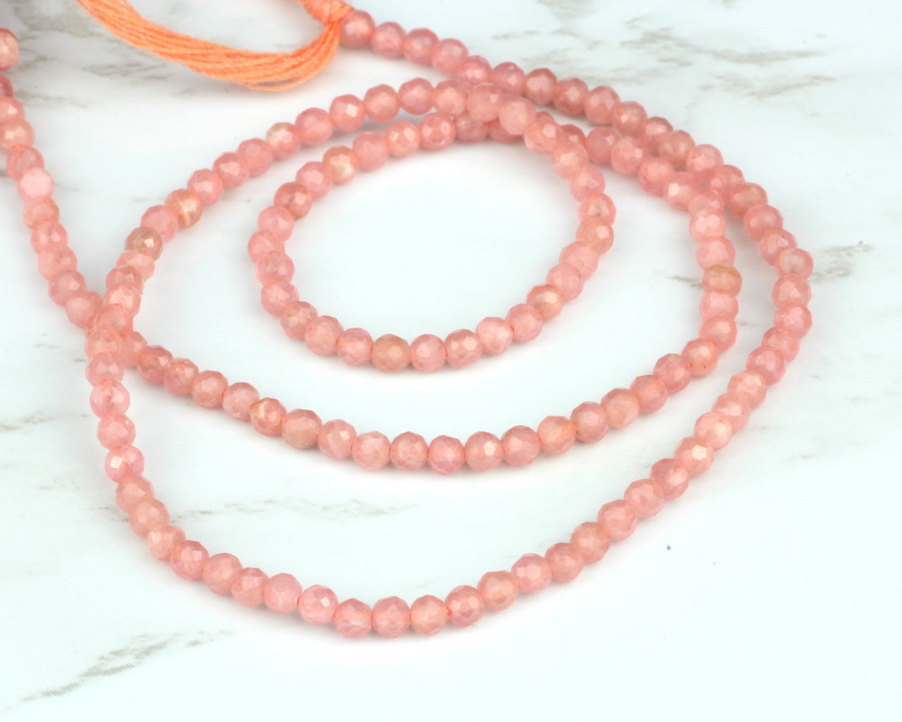 Pink Rhodochrosite 2.5mm Faceted Rounds