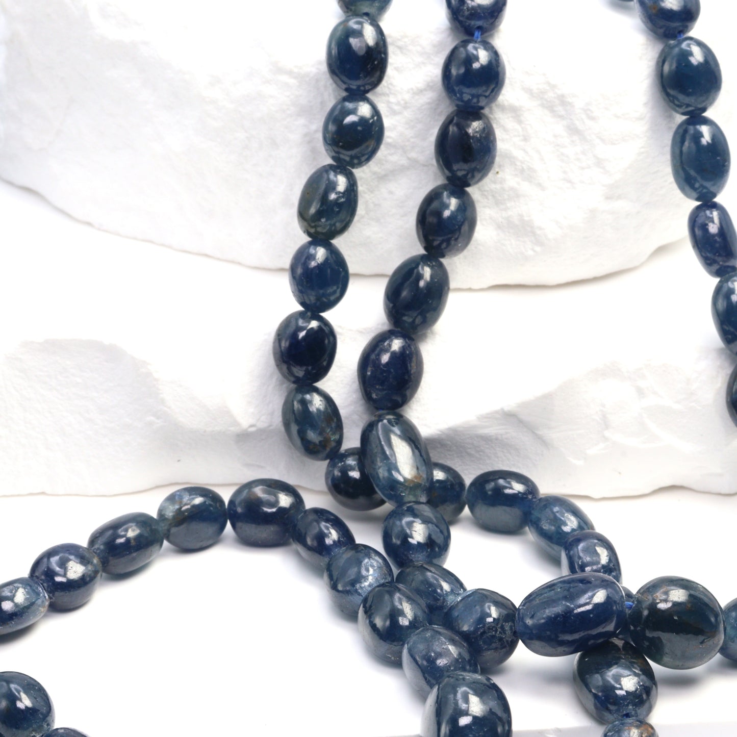 Blue Sapphire 5x7mm - 6x8mm Smooth Nuggets Bead Strand