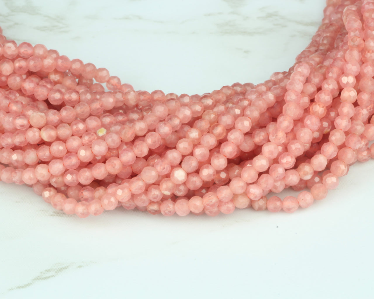 Pink Rhodochrosite 2.5mm Faceted Rounds
