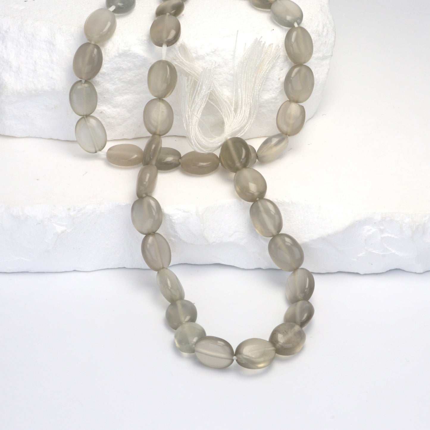 Gray Moonstone 9x7mm - 10x8mm Smooth Ovals Bead Strand