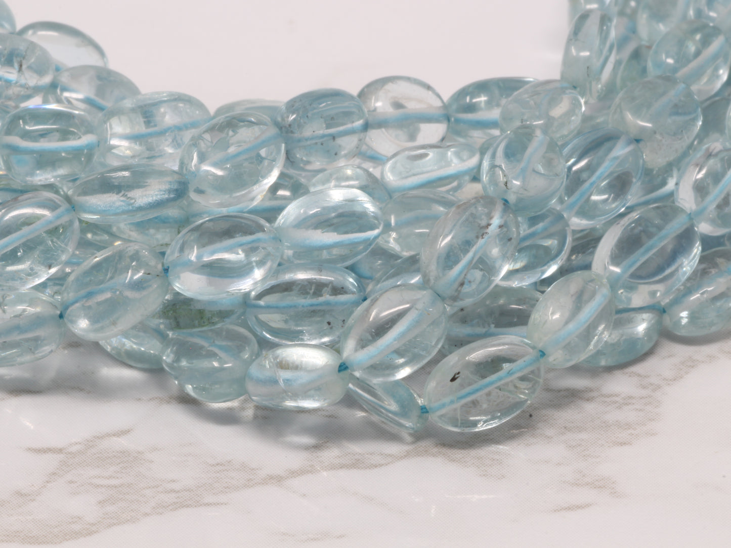 Blue Aquamarine 7x5mm - Smooth Ovals Bead Strand