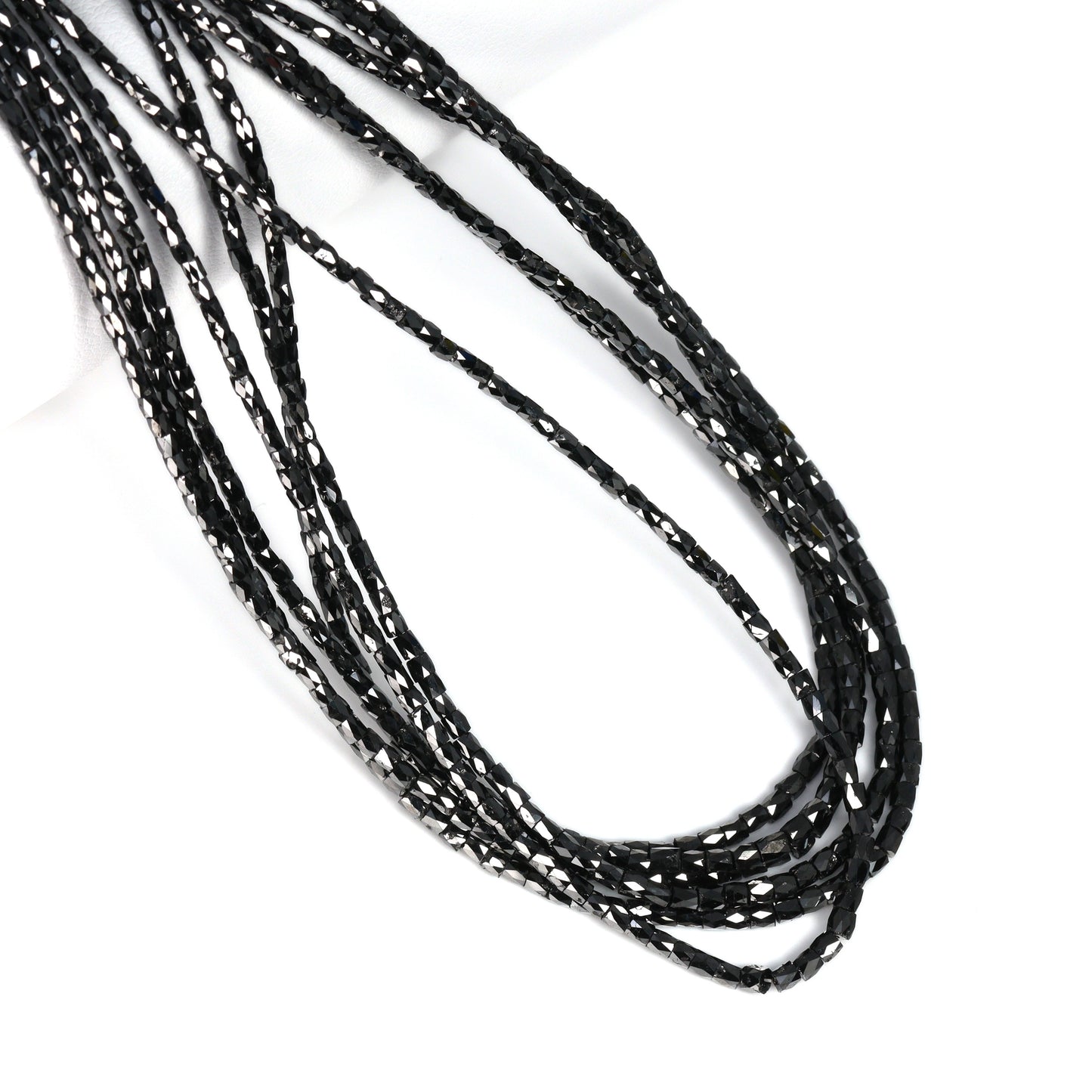 Black Diamond 2x1mm – 2.5x1.5mm Faceted Tubes Bead Strand