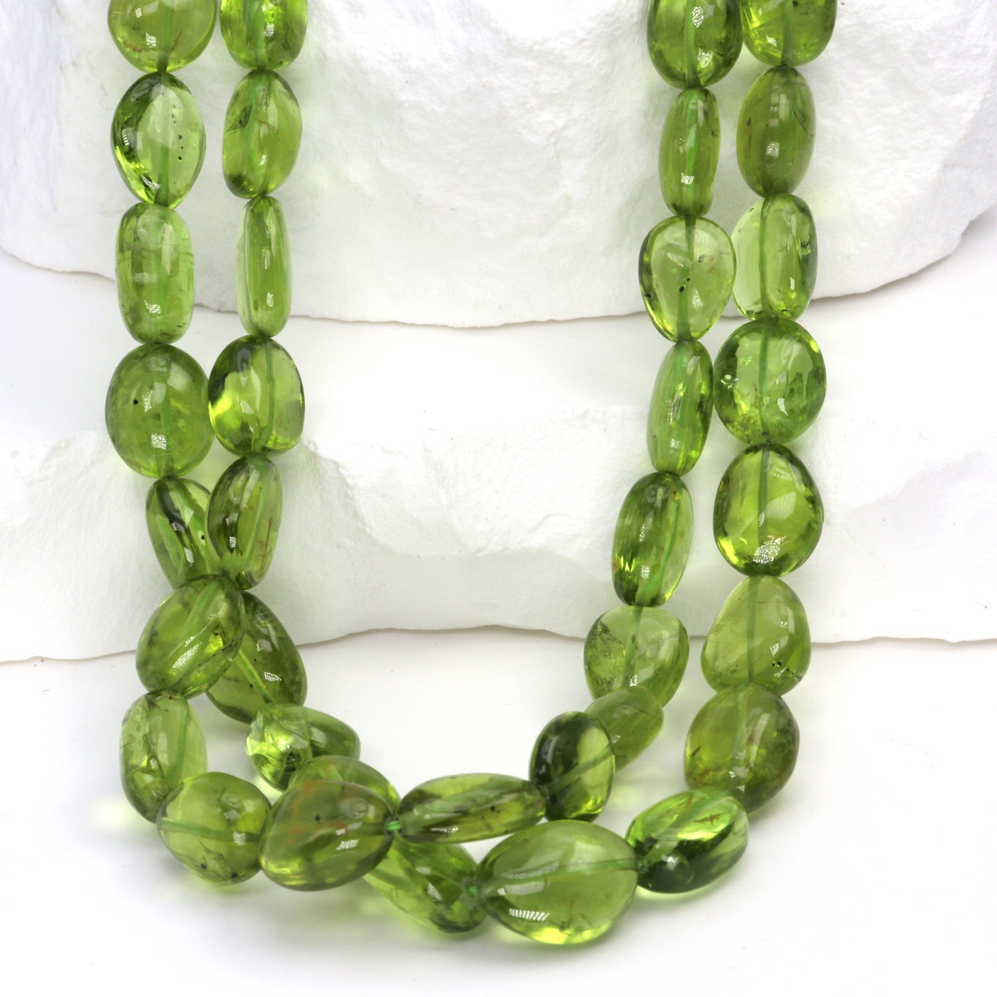 AA Green Peridot 9x7mm - 10x8mm Smooth Nuggets Bead Strand
