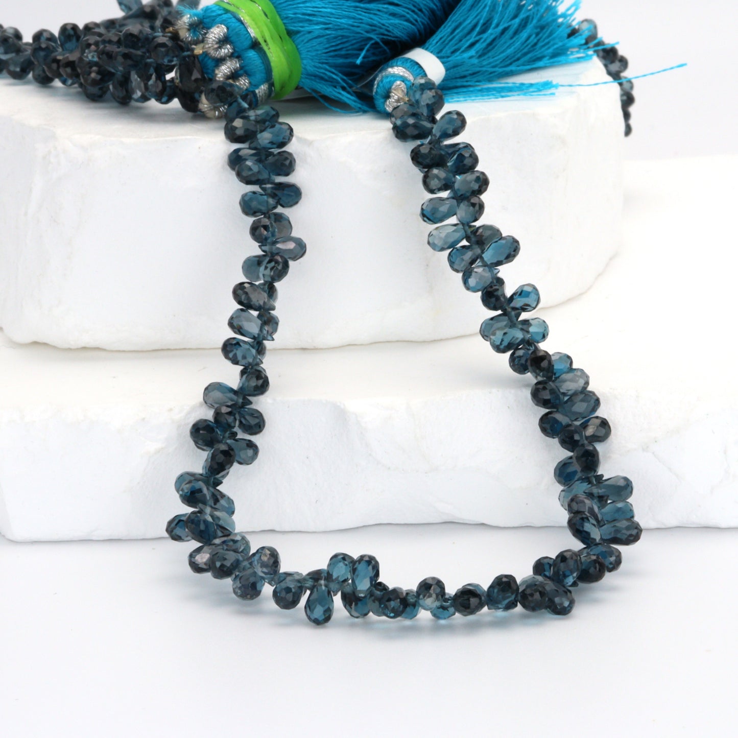 AA London Blue Topaz 4x6mm Faceted Teardrop Briolettes Bead Strand