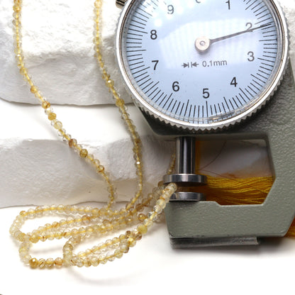 Golden Rutilated Quartz 2mm Faceted Rounds