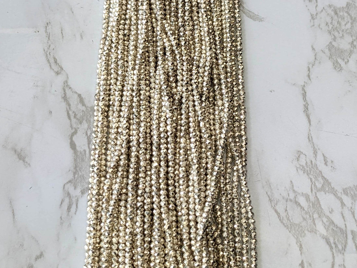 Silver Plated Pyrite 2mm Faceted Rounds