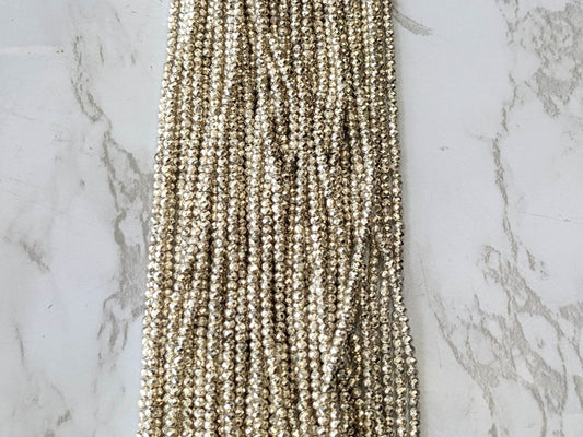 Silver Plated Pyrite 2mm Faceted Rounds