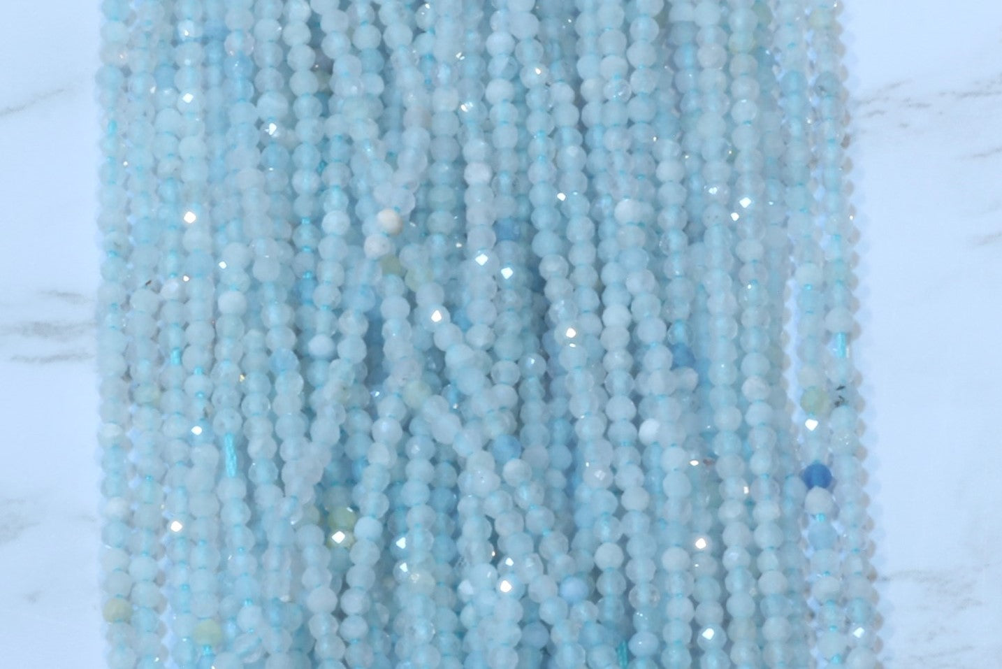 Blue Milky Aquamarine 2mm Faceted Rounds