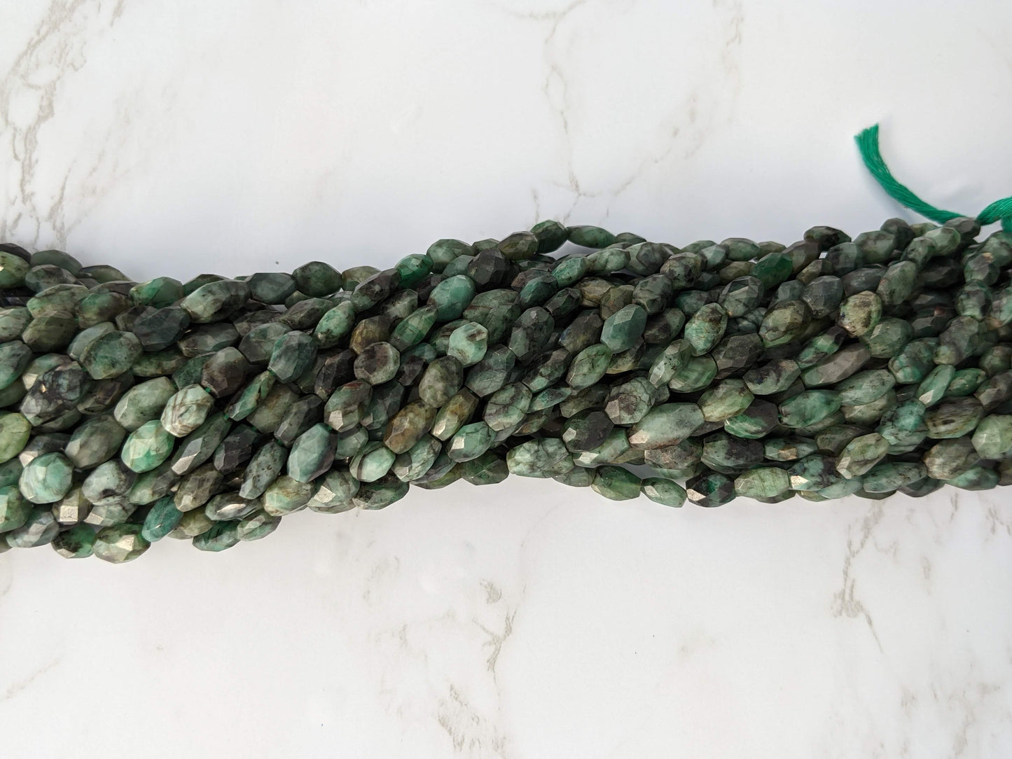 Sakoda Emerald 9x7mm Faceted Ovals