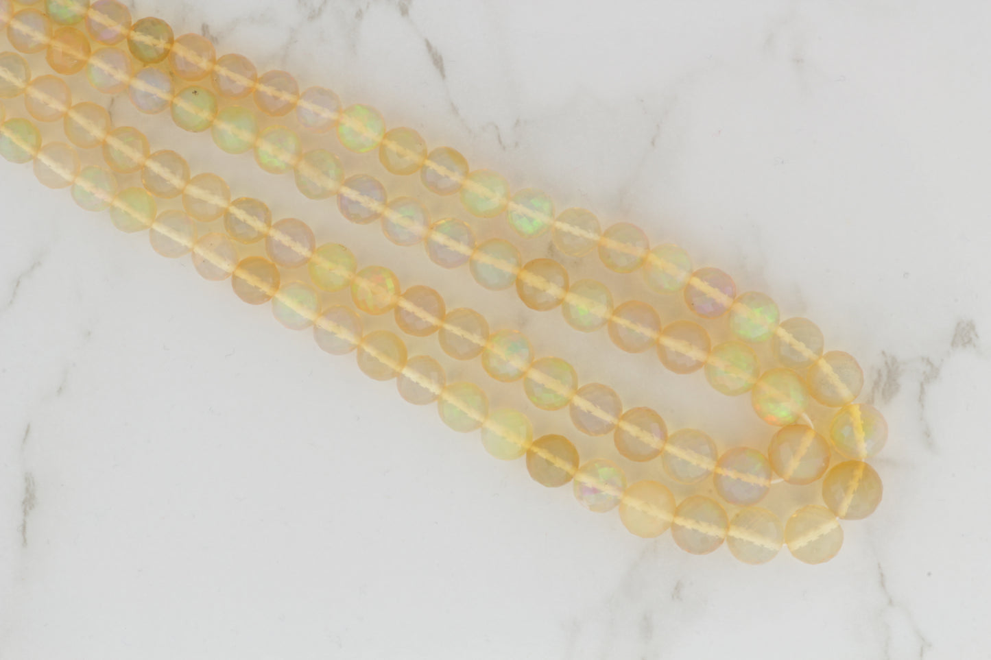 Yellow Ethiopian Opal 5mm Faceted Rounds