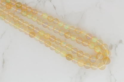Yellow Ethiopian Opal 5mm Faceted Rounds