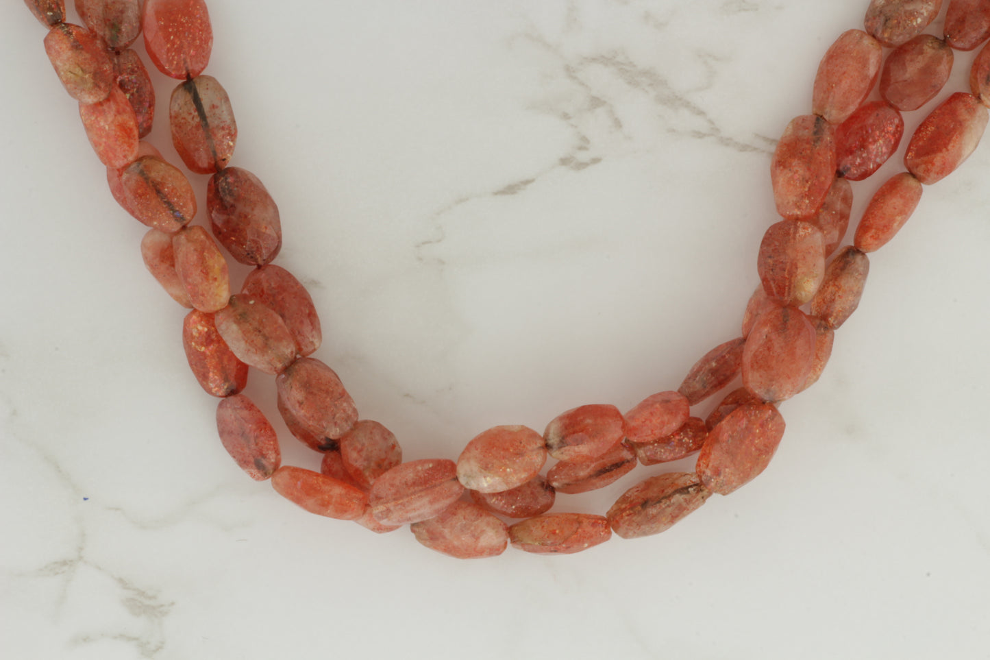 Brown Sunstone 10x7mm Faceted Ovals