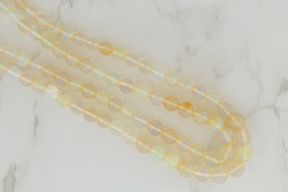 White Ethiopian Opal 5mm Faceted Rounds