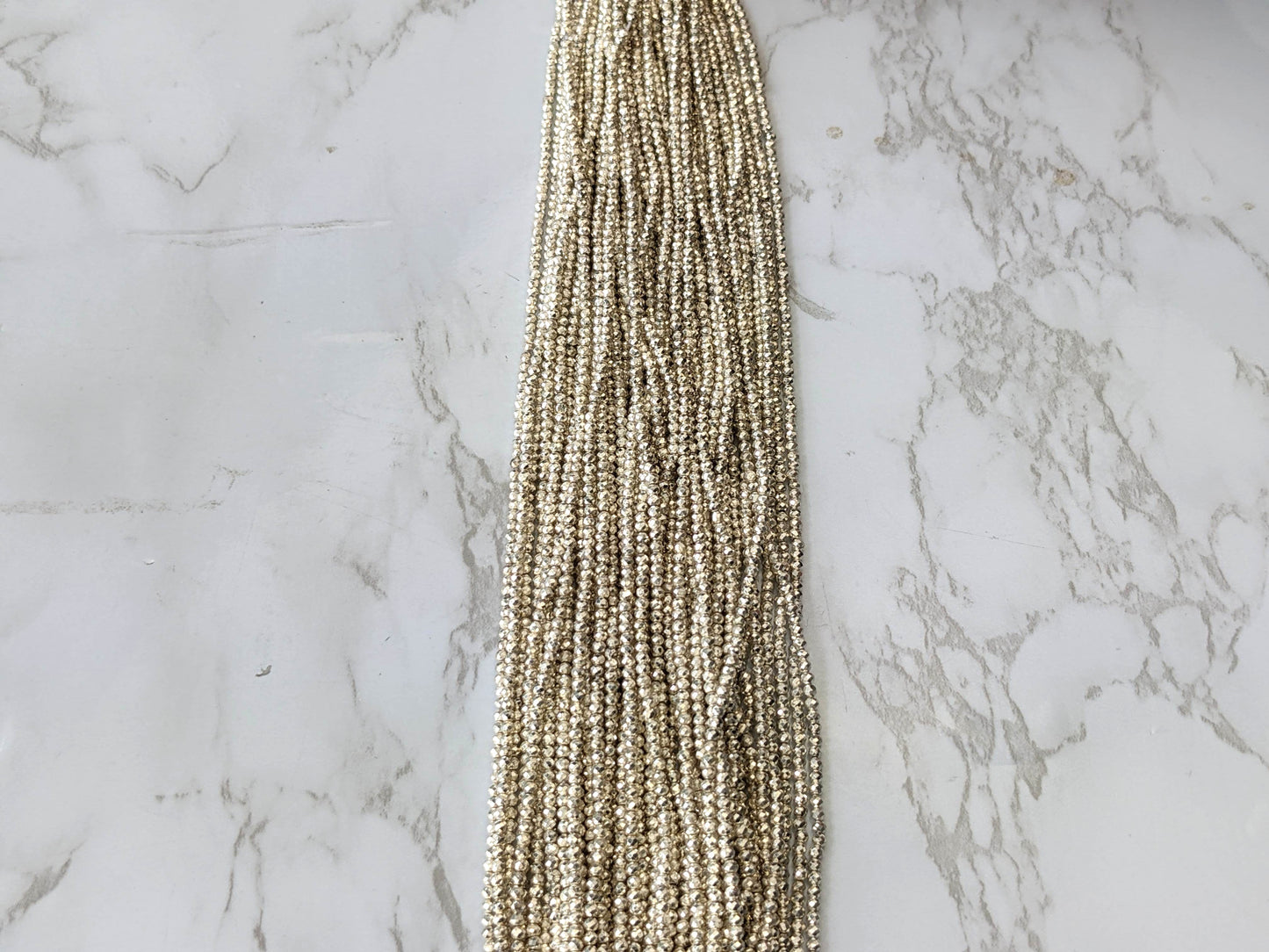 Silver Plated Pyrite 2mm Faceted Rounds