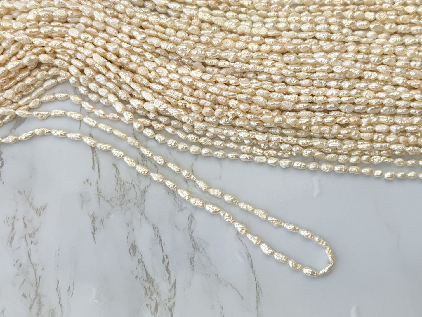White Freshwater Pearl 6x4mm Biwa Sticks