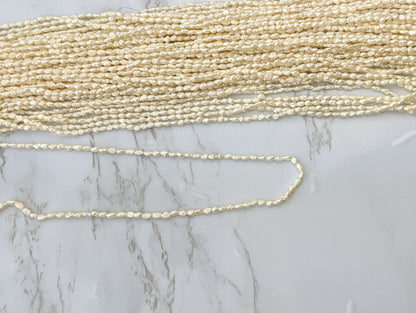 White Freshwater Pearl 4x2mm Biwa Sticks