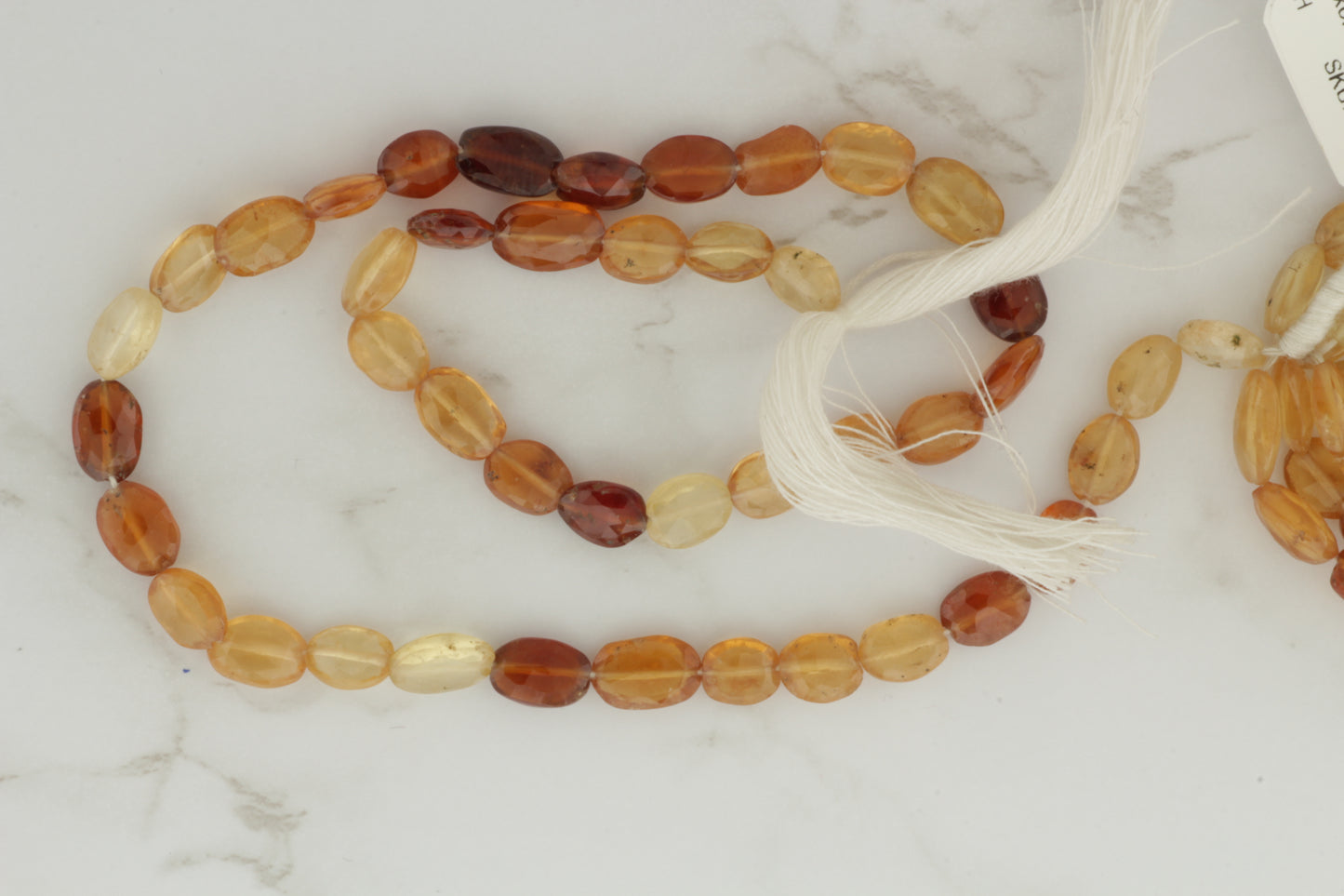 Ombre Hessonite Garnet 8x6mm Faceted Ovals