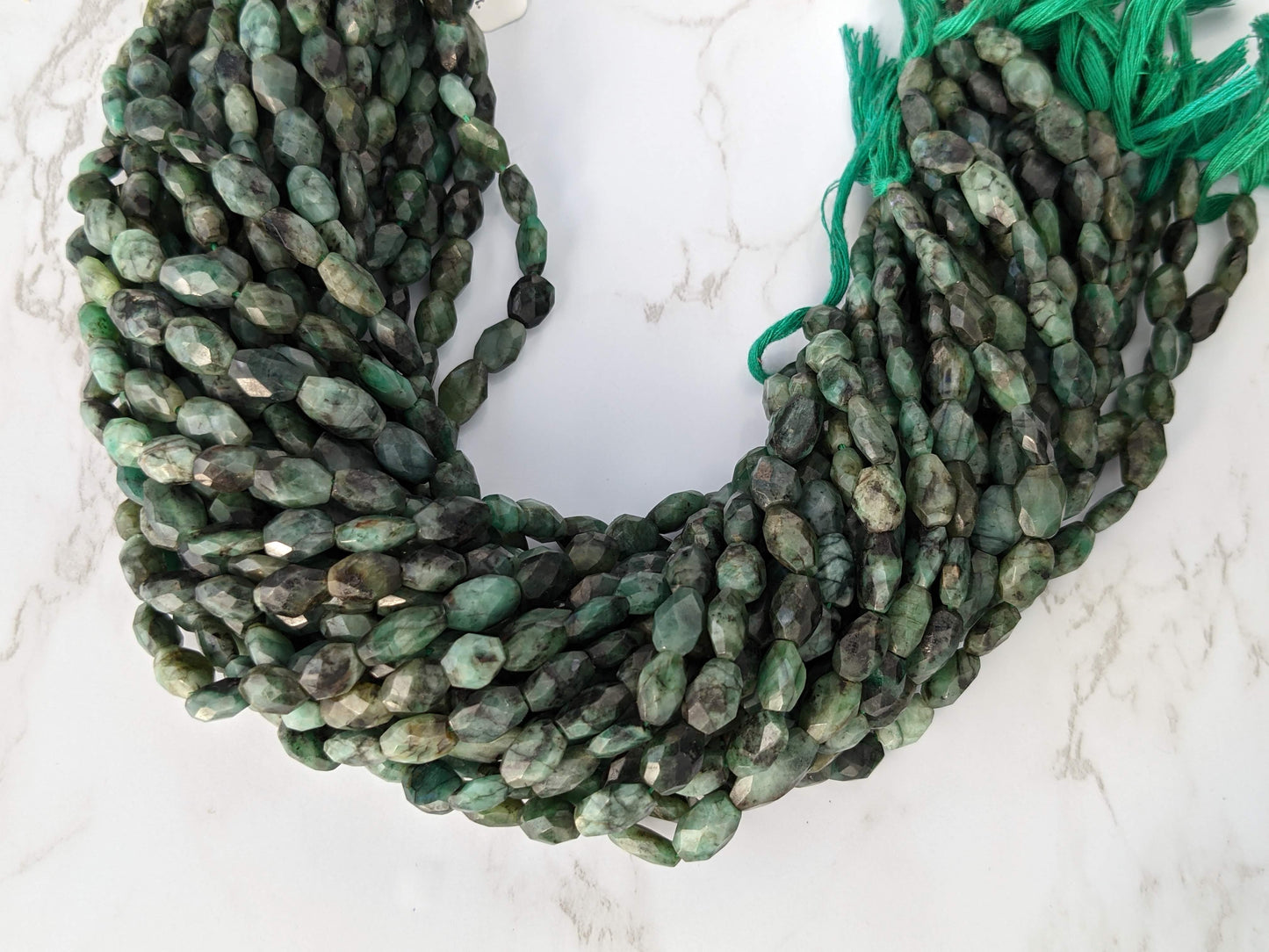 Sakoda Emerald 9x7mm Faceted Ovals