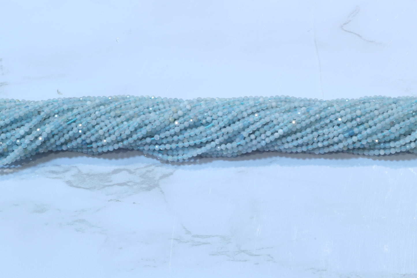 Blue Milky Aquamarine 2mm Faceted Rounds