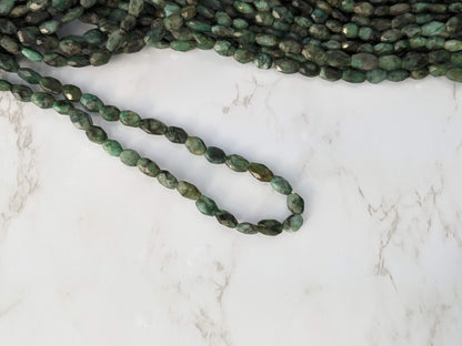 Sakoda Emerald 9x7mm Faceted Ovals