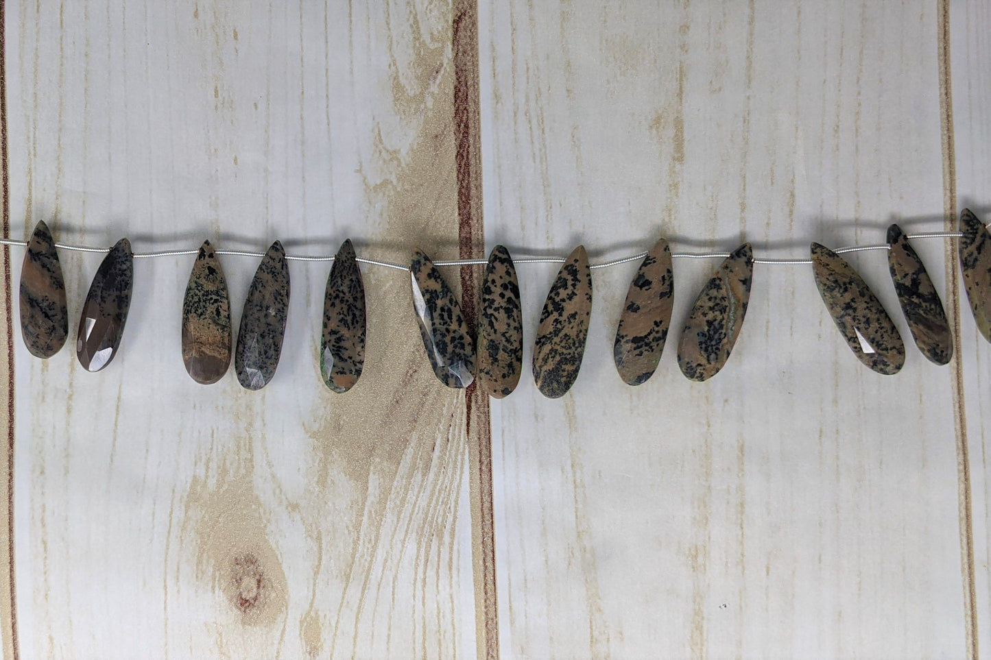 Dalmatian Jasper 25x10mm Faceted Pear Shaped Briolettes