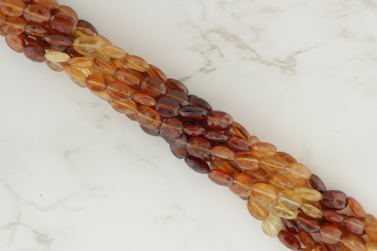 Ombre Hessonite Garnet 8x6mm Faceted Ovals