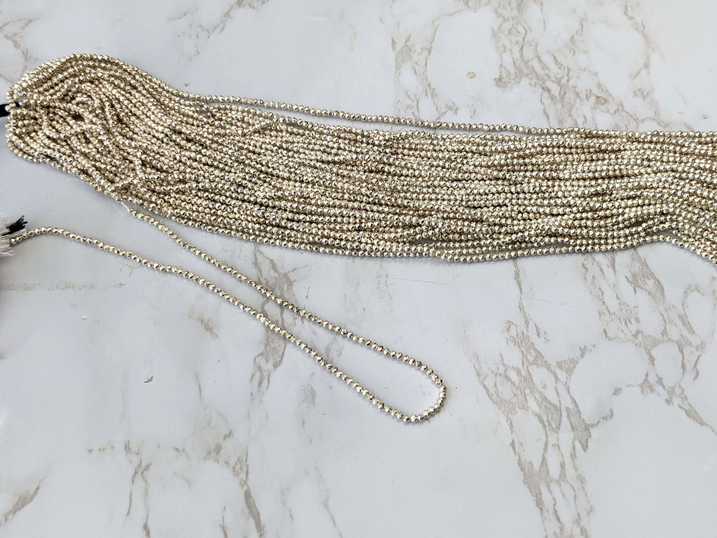 Silver Plated Pyrite 2mm Faceted Rounds