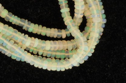 Warm White Ethiopian Opal 4mm Smooth Rondelles