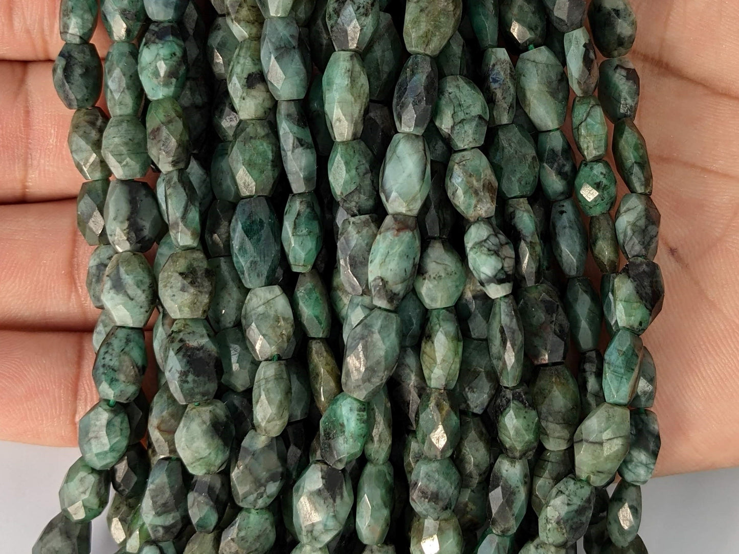 Sakoda Emerald 9x7mm Faceted Ovals