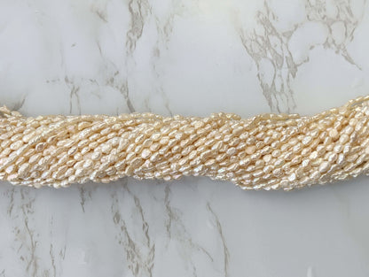 White Freshwater Pearl 6x4mm Biwa Sticks