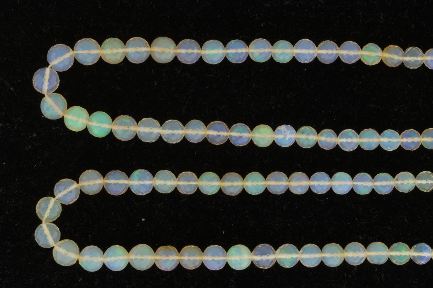 White Ethiopian Opal 5mm Faceted Rounds