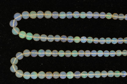 White Ethiopian Opal 5mm Faceted Rounds