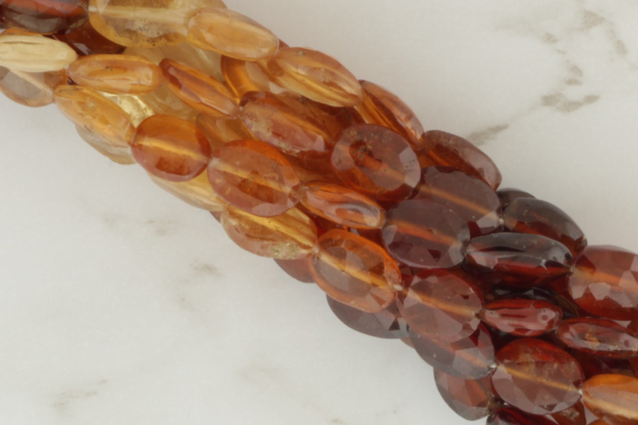 Ombre Hessonite Garnet 8x6mm Faceted Ovals