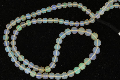 White Ethiopian Opal 5mm Faceted Rounds