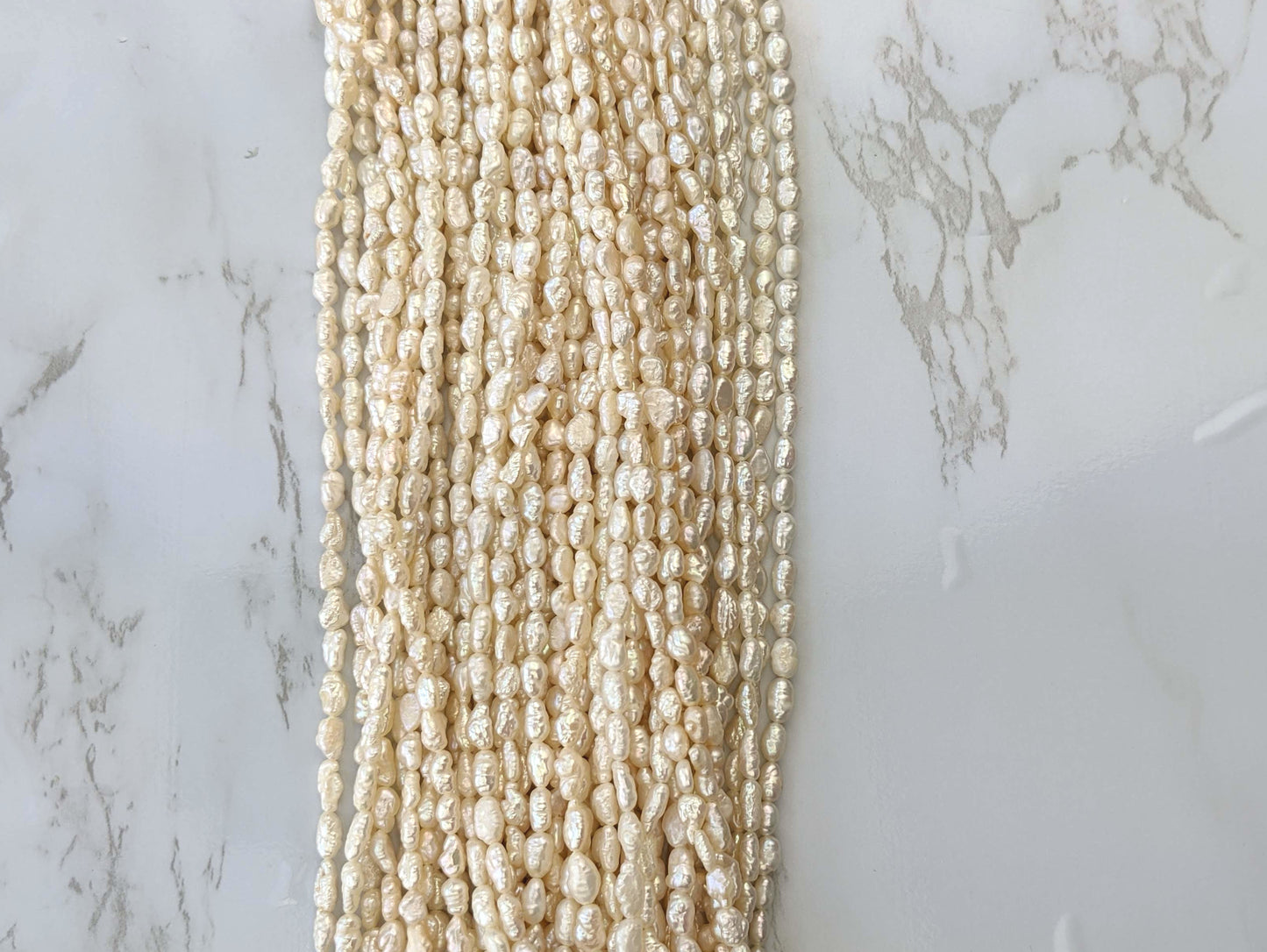 White Freshwater Pearl 6x4mm Biwa Sticks